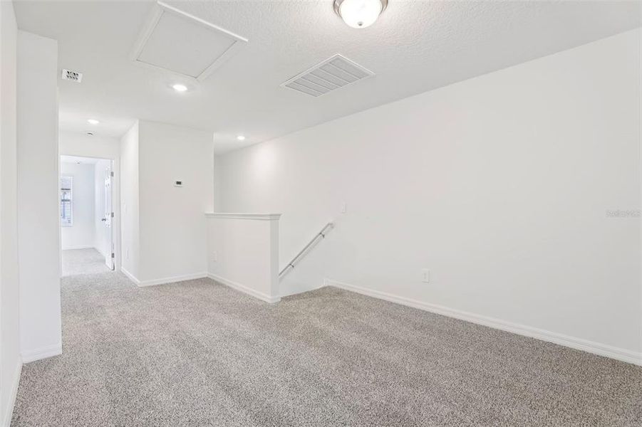 Spacious, unfurnished interior of a new home in The Meadow at Crossprairie Townes, St. Cloud (Image 23).