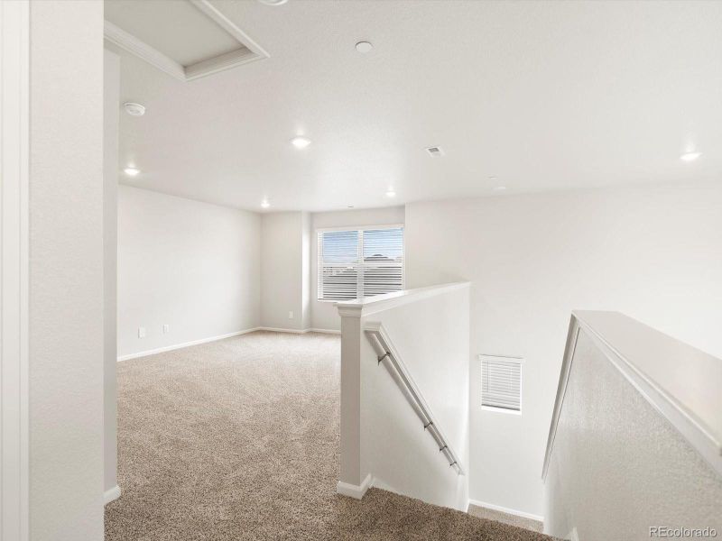 Spacious, unfurnished interior of a new home in Buffalo Highlands: The Flora Collection, Commerce City (Image 26).