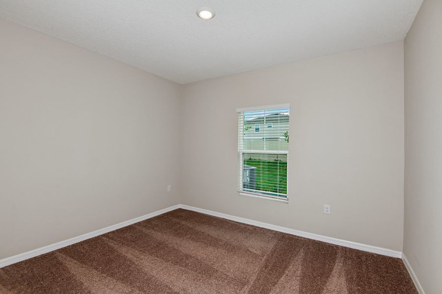 Spacious, unfurnished interior of a new home in Pasadena Ridge, Dade City (Image 18).