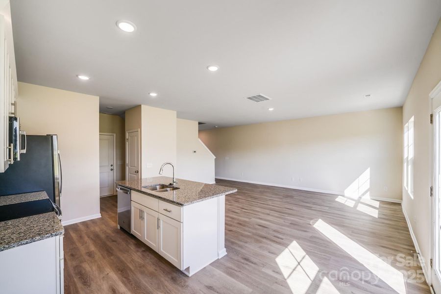 Furnished interior view inside a new home in , Statesville (Image 13).