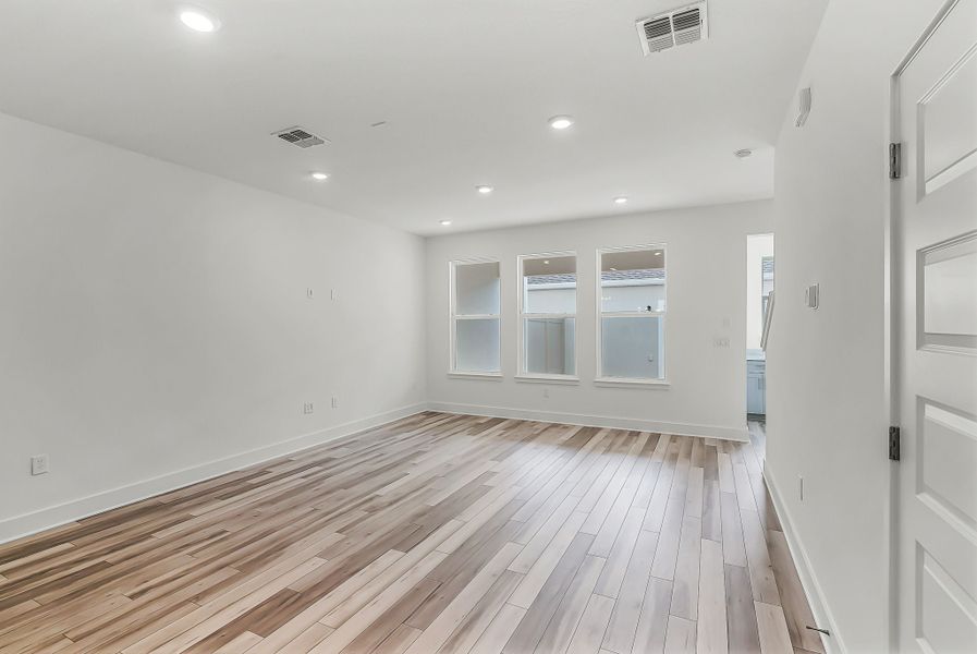 Representative unfurnished interior of a home built from the Newton by Rockwell Homes in Harvest at Ovation - Townhomes, Winter Garden (Image 66). Representative unfurnished interior of a home built from the Newton by Rockwell Homes in Harvest at Ovation - Townhomes, Winter Garden (Image 66).