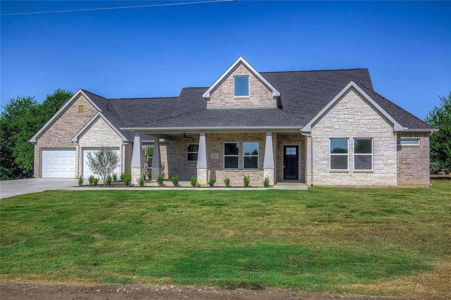 Front exterior of a new home in , Farmersville, TX, highlighting curb appeal (Image 1).