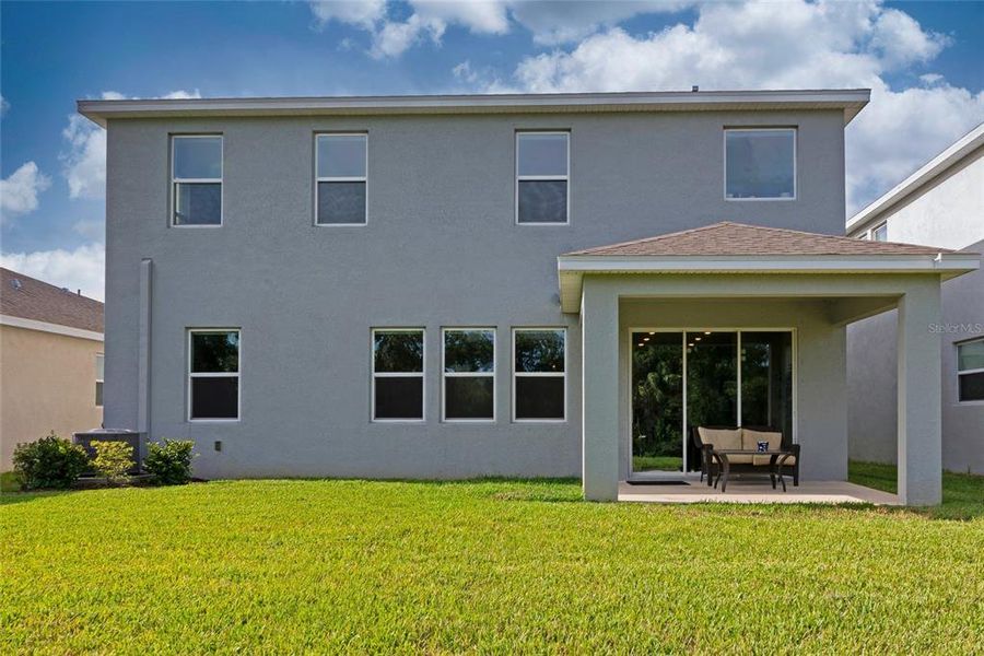 Front exterior of a new home in , Apollo Beach, FL, highlighting curb appeal (Image 27).