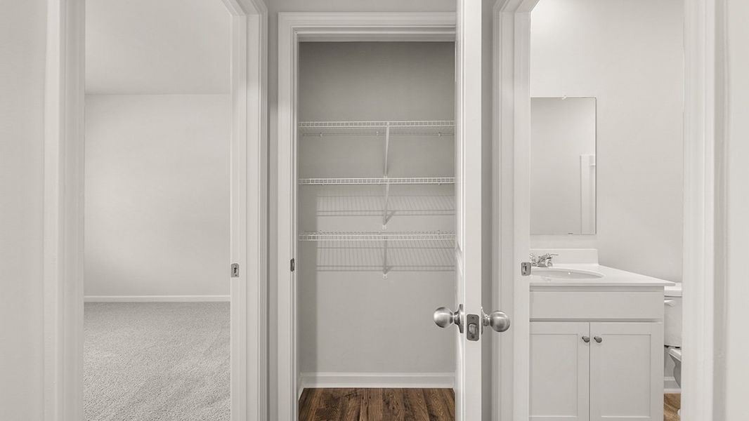 Representative furnished interior of a home built from the Hanover by D.R. Horton in Thompson Ridge, Dallas (Image 6).