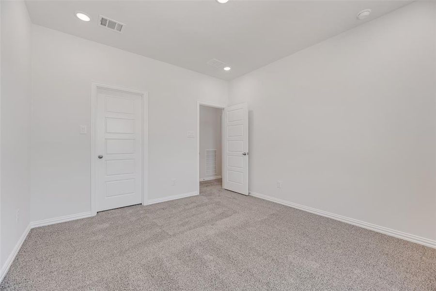 Spacious, unfurnished interior of a new home in Valencia On The Lake, Little Elm (Image 29).