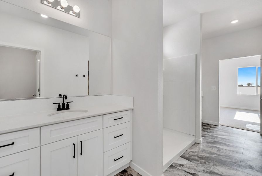 Representative furnished interior of a home built from the Stratton by Baessler Homes in Hudson Hills, Hudson (Image 13).