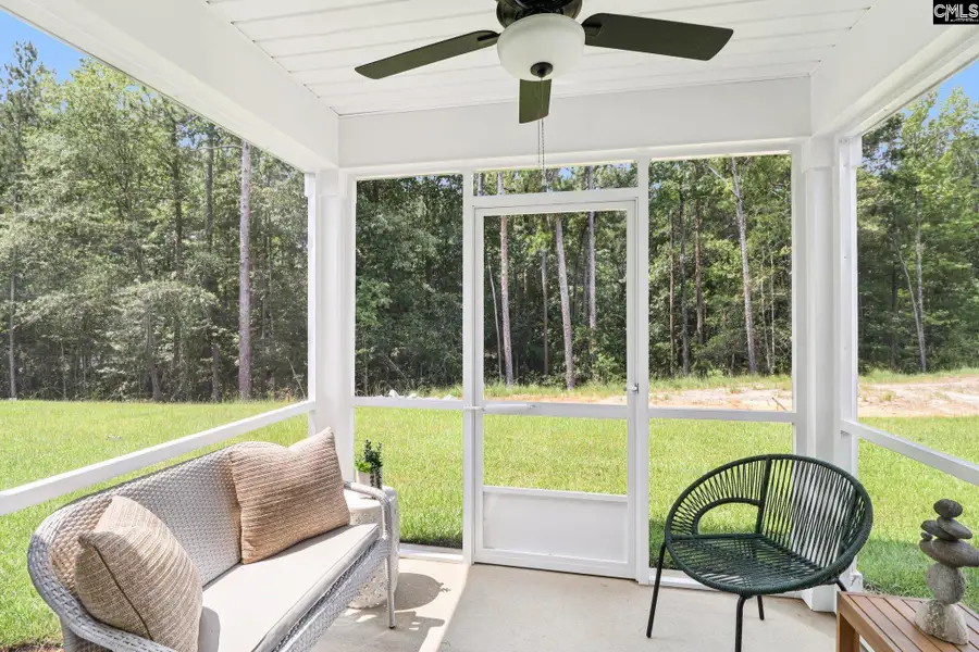 Exterior details and patio area of a home in Piney Woods Bluff, Columbia (Image 1).