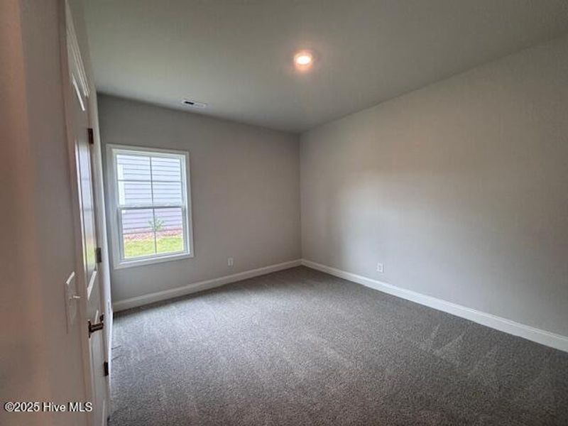 Spacious, unfurnished interior of a new home in River Village Square in River Landing, Wallace (Image 11).