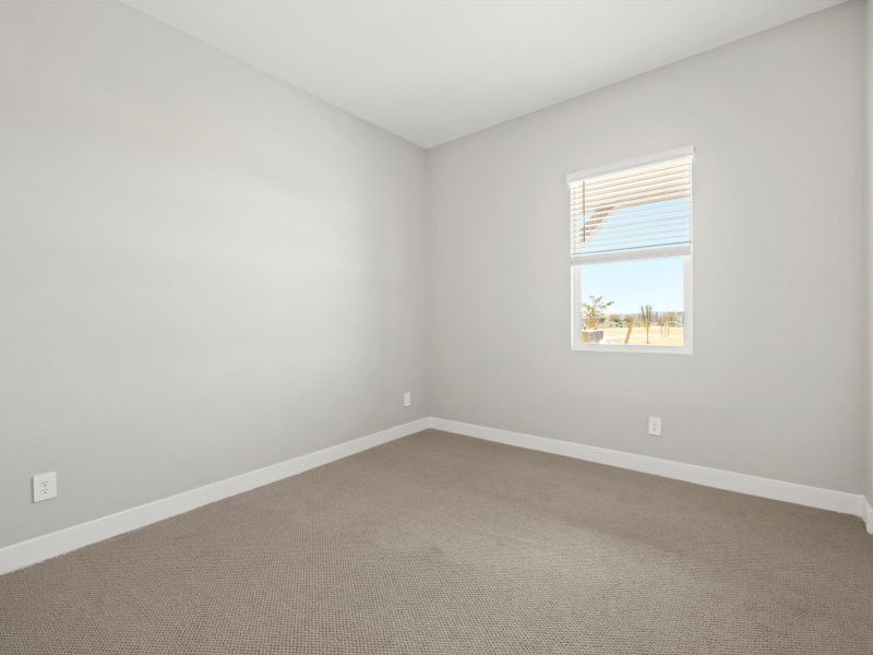 Spacious, unfurnished interior of a new home in White Tank Foothills Reserve Series, Waddell (Image 16).