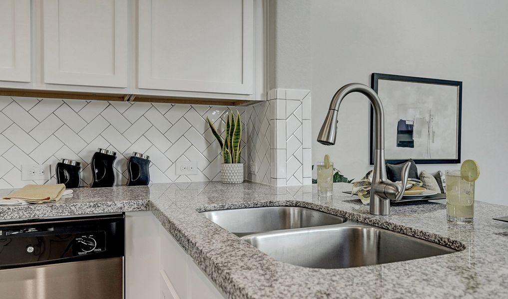 Gorgeous tile backsplash in kitchen