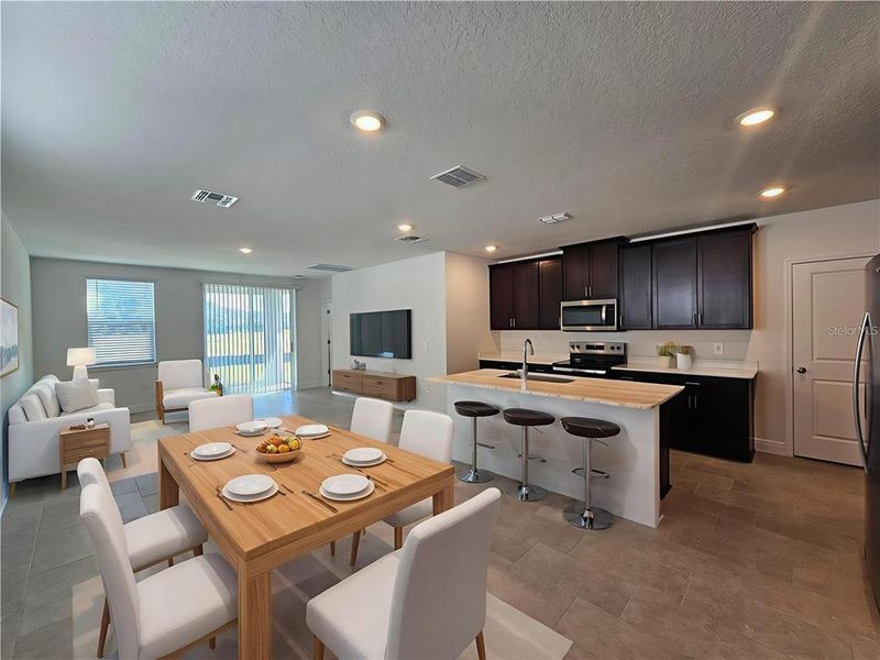 Furnished interior view inside a new home in The Reserve at Hammock Oaks - Classic Series, Lady Lake (Image 8).