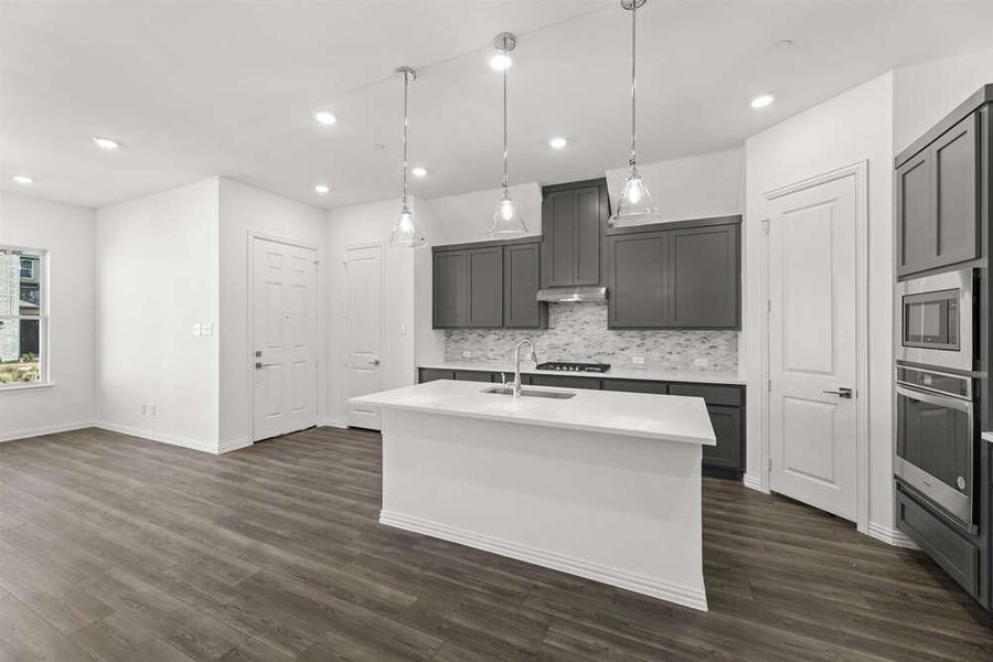 Brown Townhome Kitchen by Ashton Woods