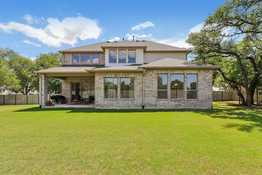 Exterior details and patio area of a home in Wolf Ranch West Bend - 70', Georgetown (Image 4).
