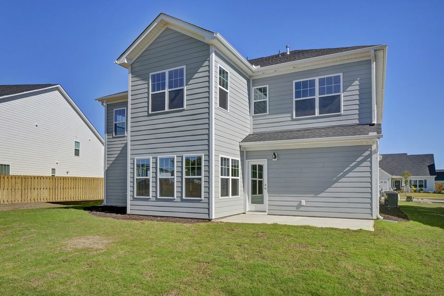 Exterior details and patio area of a home in Grand Park, Leland (Image 4).