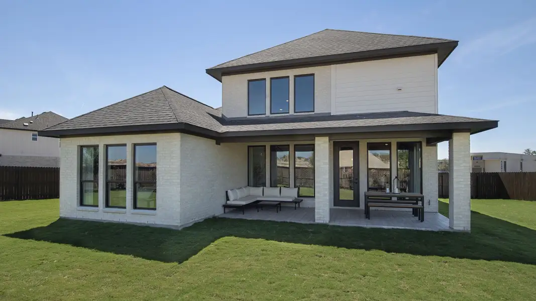 Exterior details and patio area of a home in Parkside on the River West, Georgetown (Image 3).