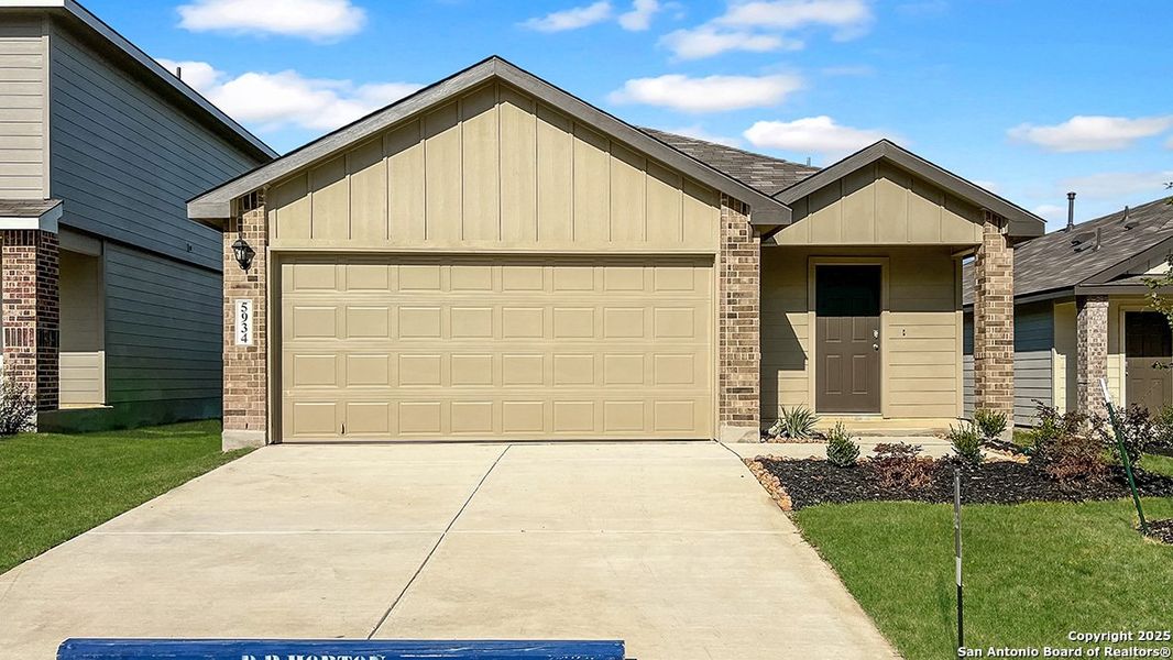 Front exterior of a new home in Applewood, San Antonio, TX, highlighting curb appeal (Image 20).
