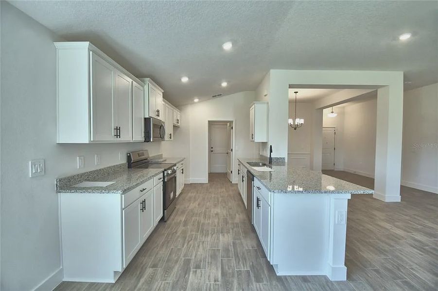 Furnished interior view inside a new home in Lake Juliana Estates, Auburndale (Image 5).