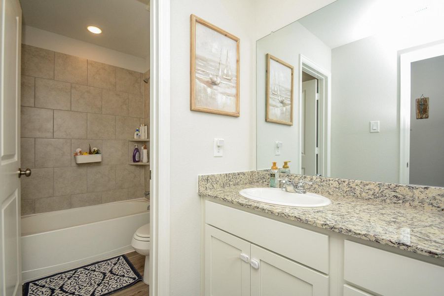 Furnished interior view inside a new home in Granger Pines, Conroe (Image 28).