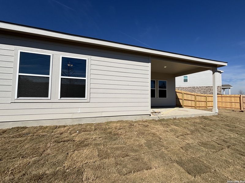 Exterior details and patio area of a home in The Summit at Saddlebrook Ranch 55's, Schertz (Image 26).