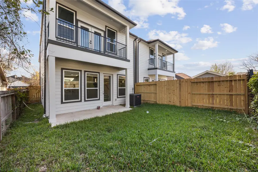 Exterior details and patio area of a home in , Houston (Image 3).