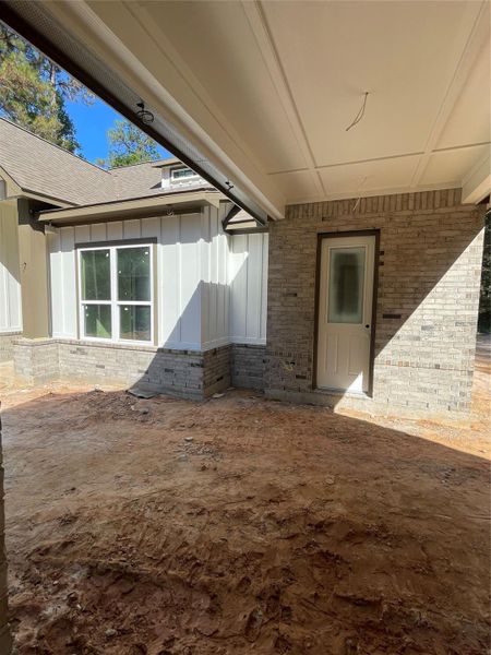 Covered Breezeway to the Garage from the Laundry Room Covered Breezeway to the Garage from the Laundry Room