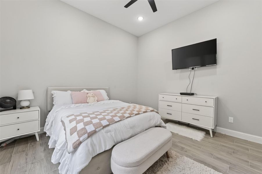 Secondary bedroom featuring high ceilings. Secondary bedroom featuring high ceilings.