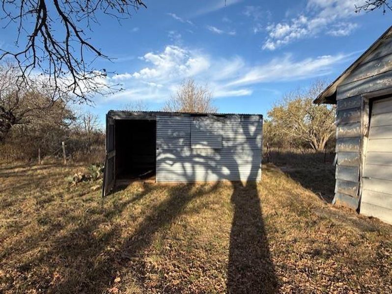 Exterior details and patio area of a home in , May (Image 2). Exterior details and patio area of a home in , May (Image 2).