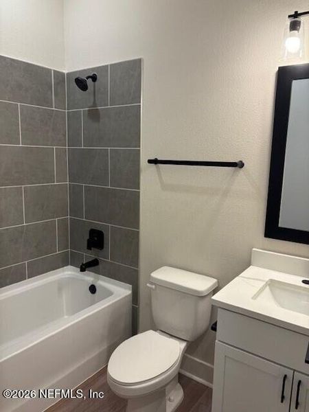 Furnished interior view inside a new home in Stables at Cary Forest, Bryceville (Image 6).