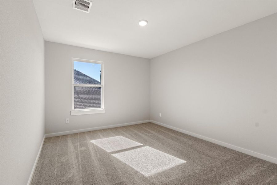 Spacious, unfurnished interior of a new home in Sunterra, Katy (Image 18).