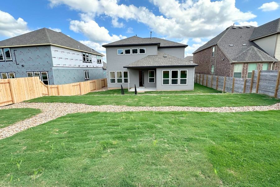 Exterior details and patio area of a home in Bluffview Reserve, Leander (Image 4).