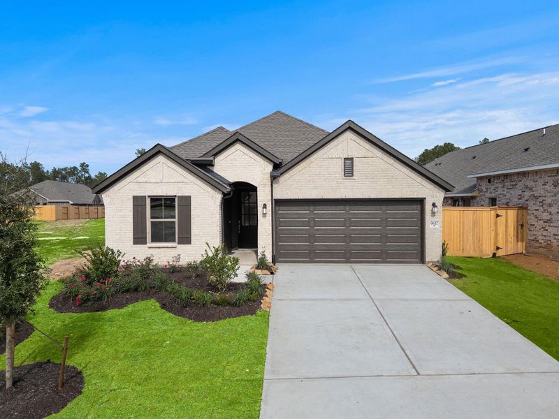 Front exterior of a new home in The Highlands 45', Porter, TX, highlighting curb appeal (Image 21).