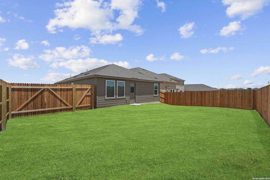 Exterior details and patio area of a home in Guadalupe Ridge, New Braunfels (Image 2).