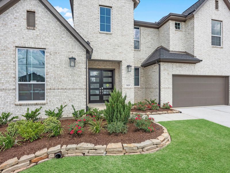 Exterior details and patio area of a home in Dunham Pointe, Cypress (Image 3). Exterior details and patio area of a home in Dunham Pointe, Cypress (Image 3).