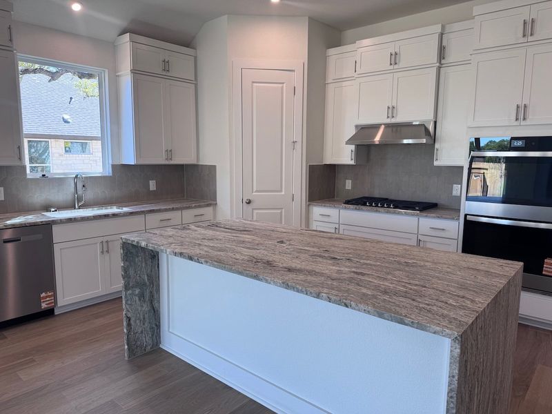 Furnished interior view inside a new home in Persimmon, Buda (Image 2). Furnished interior view inside a new home in Persimmon, Buda (Image 2).