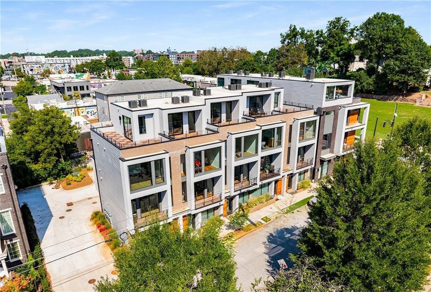 Front exterior of a new home in Ten 5 Summerhill, Atlanta, GA, highlighting curb appeal (Image 19). Front exterior of a new home in Ten 5 Summerhill, Atlanta, GA, highlighting curb appeal (Image 19).
