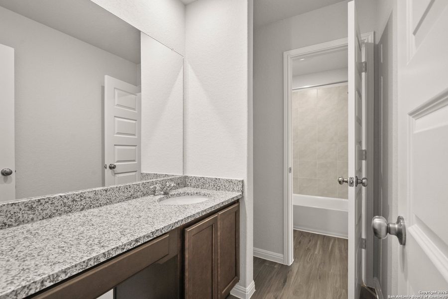 Furnished interior view inside a new home in Cinco Lakes, San Antonio (Image 11).