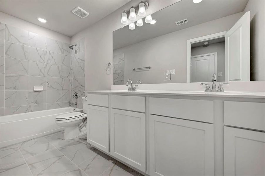 Furnished interior view inside a new home in Lily Creek at Sutton Fields, Aubrey (Image 17).