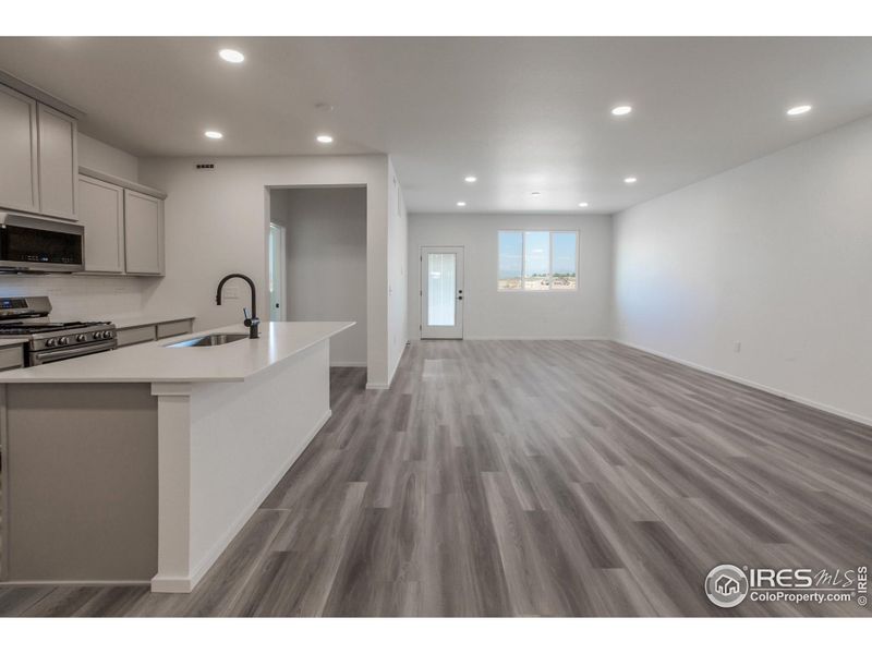 KITCHEN, DINING AND LIVING ROOM