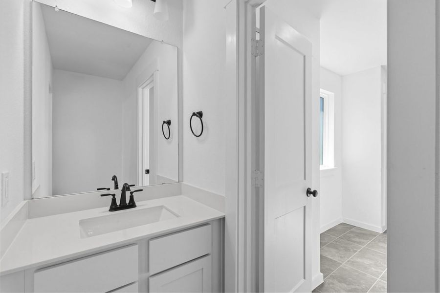 Furnished interior view inside a new home in Hunters Crossing, Sealy (Image 10).