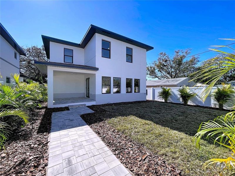 Front exterior of a new home in , St. Petersburg, FL, highlighting curb appeal (Image 28). Front exterior of a new home in , St. Petersburg, FL, highlighting curb appeal (Image 28).