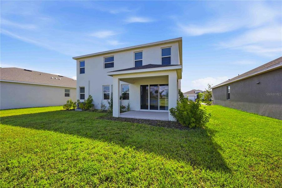 Exterior details and patio area of a home in Coddington, Bradenton (Image 33).
