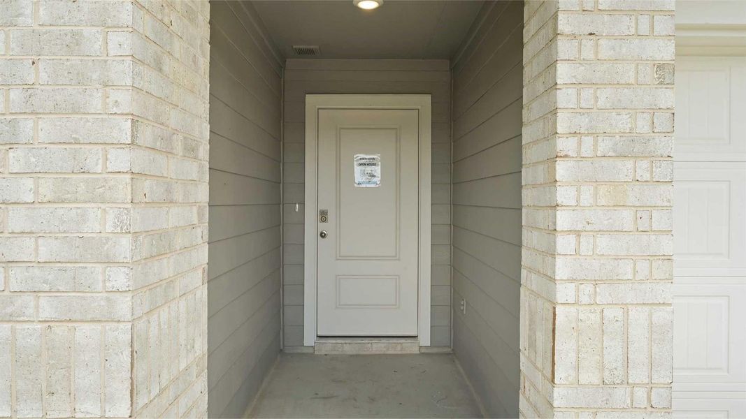 Exterior details and patio area of a home in Tamarron, Fulshear (Image 24).