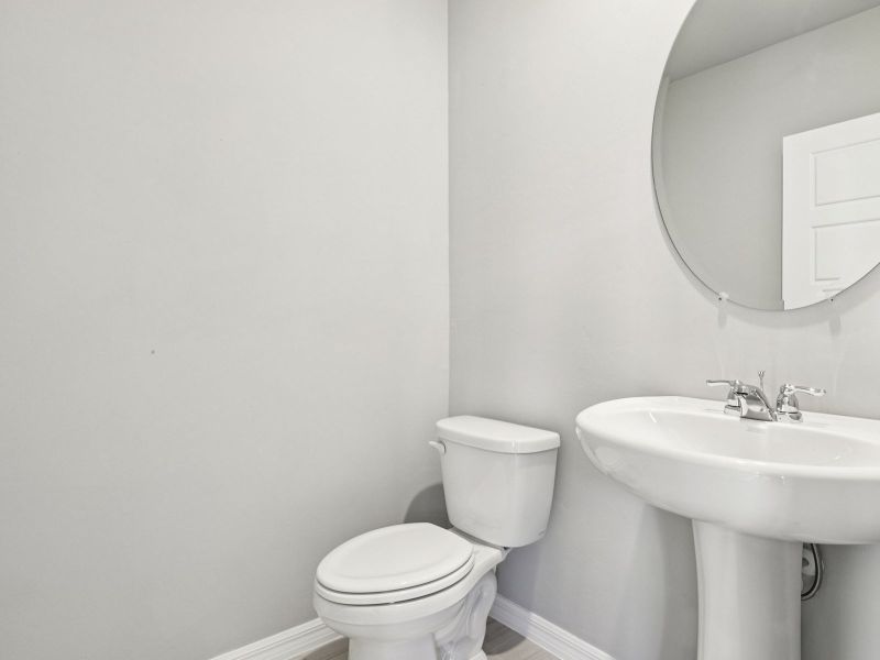 Furnished interior view inside a new home in Crescent Lakes - Premier Series, Punta Gorda (Image 9).