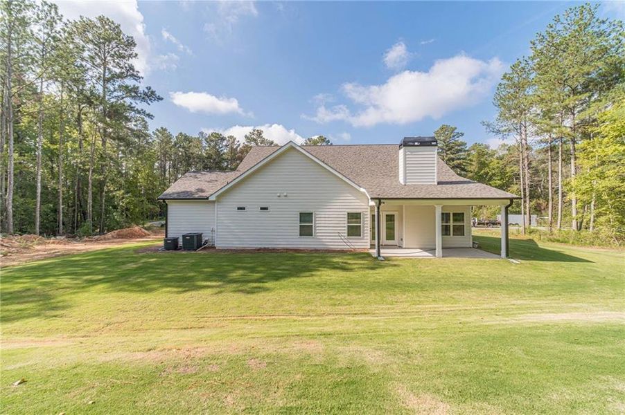 Exterior details and patio area of a home in , Loganville (Image 22).