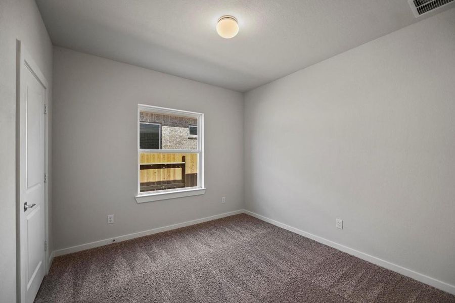 Spacious, unfurnished interior of a new home in Sunterra, Katy (Image 13).