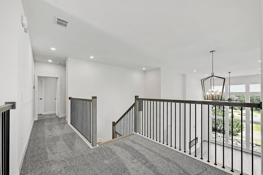 Spacious, unfurnished interior of a new home in Rough Hollow, Austin (Image 17).