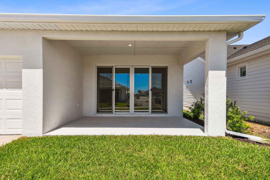 Representative exterior details of a home built from the The Malone by David Weekley Homes in SeaFlower – Bungalow Homes, Bradenton (Image 3).