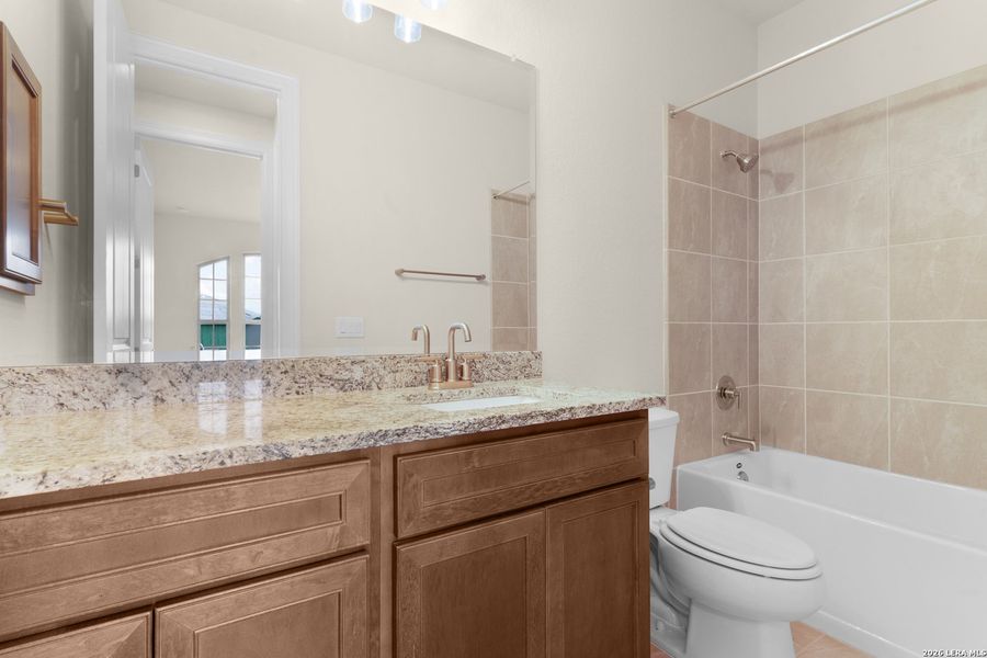 Furnished interior view inside a new home in Willis Ranch, San Antonio (Image 13).