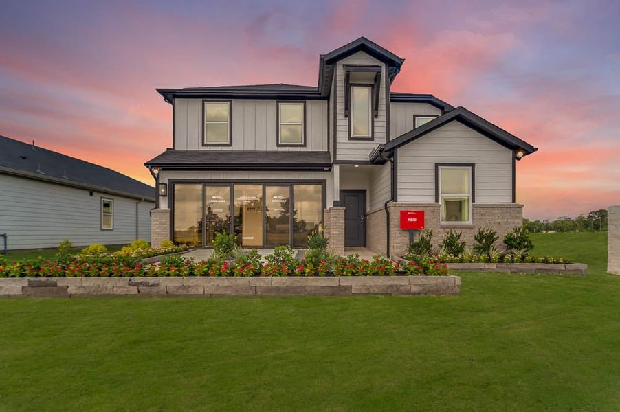 Representative exterior photo of a completed home built from the Reid by Taylor Morrison in Firesong, Montgomery, TX (Image 22). Representative exterior photo of a completed home built from the Reid by Taylor Morrison in Firesong, Montgomery, TX (Image 22).