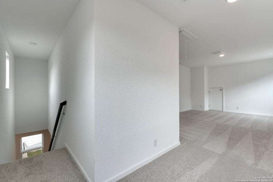 Spacious, unfurnished interior of a new home in Meadows at Hennersby Hollow 40's, San Antonio (Image 33).